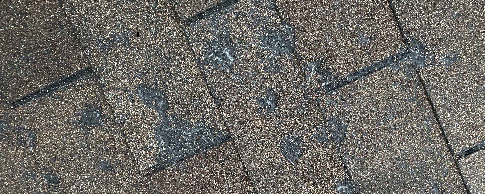 What does hail damage look like on a roof: Signs, Dangers, and Repairs