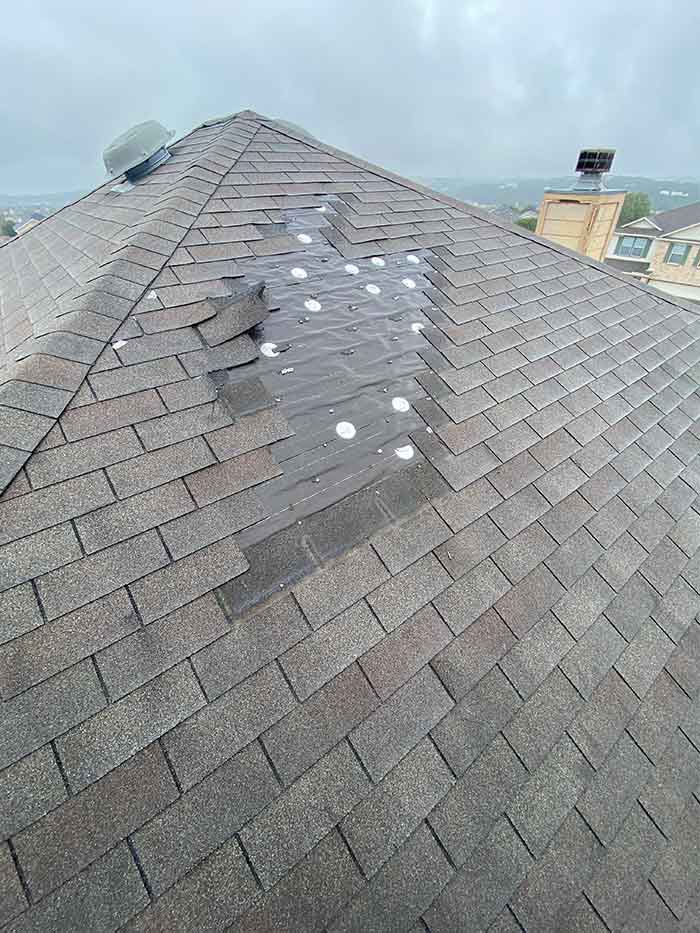 wind damage roof repair