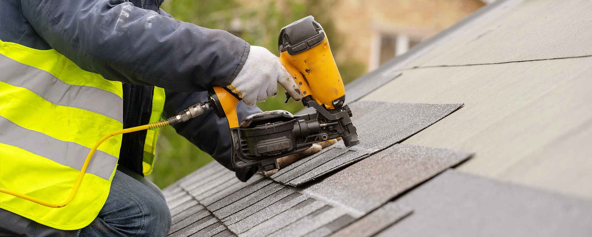 roofing contractor on roof